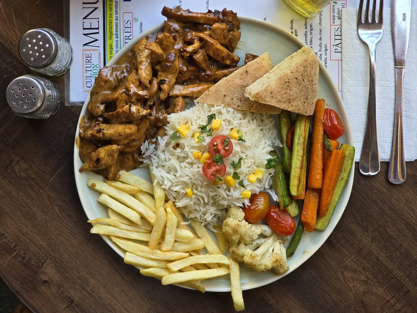 Grilled chicken with rice, fries and roasted vegetables at Culture Box